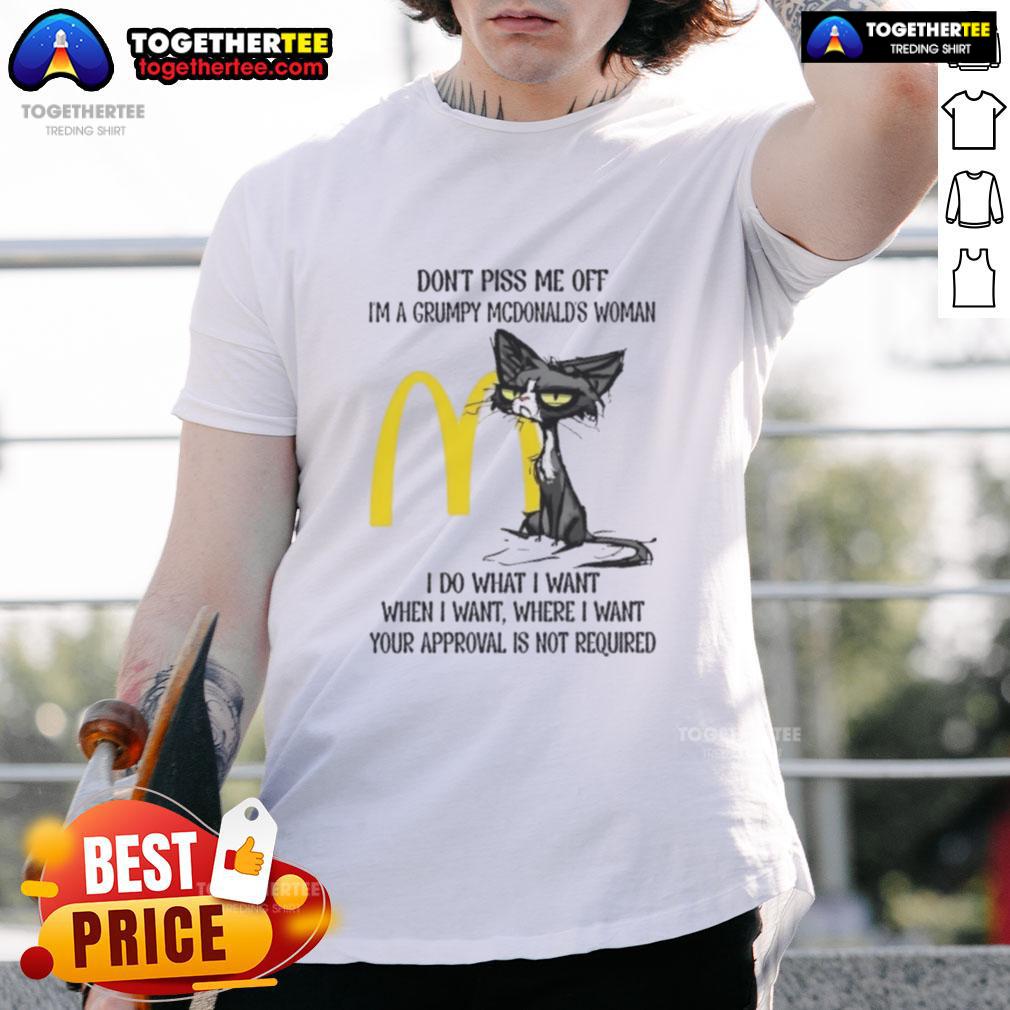 Alt Text: Grumpy cat wearing a Good Tired Cat t-shirt, perfect for McDonald's lovers who embrace their sassy side.