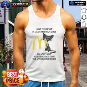 Grumpy woman in a tank top with a cat, captioned Good Tired Cat, Don't Piss Me Off showcasing a playful attitude.