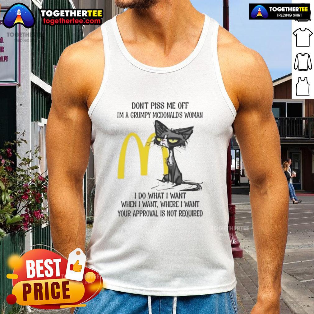 Grumpy woman in a tank top with a cat, captioned Good Tired Cat, Don't Piss Me Off showcasing a playful attitude.