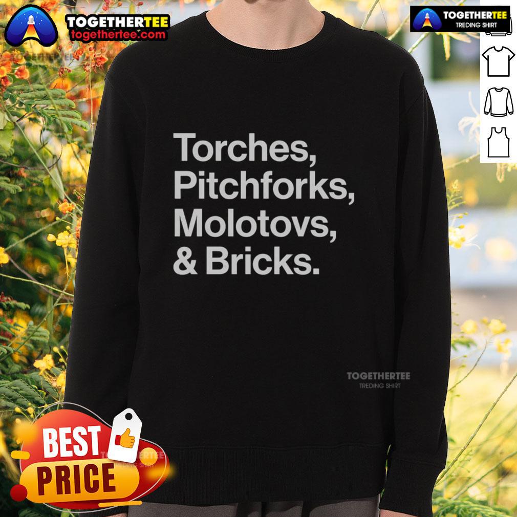 Good Torches Pitchforks Molotovs and Bricks 2025 World Tour sweatshirt featuring bold graphics and vibrant colors.