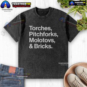 Good Torches Pitchforks Molotovs and Bricks 2025 World Tour washed t-shirt featuring bold graphic design.