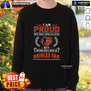 Happy Baltimore Orioles fan wearing a proud sweatshirt, celebrating their love for the team and sports spirit.