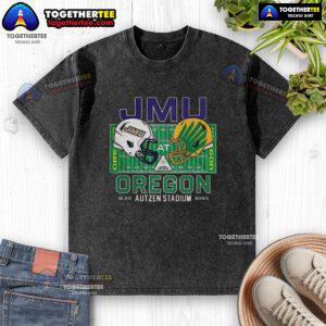 Happy fan wearing a James Madison Dukes vs Oregon Ducks NCAA CFP 2025 helmet shirt at Autzen Field.