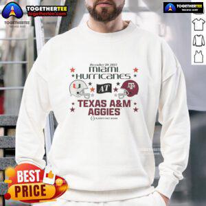 Hot Texas A&M Aggies vs Miami Hurricanes 2025 CFP first round matchup sweatshirt featuring team helmets.