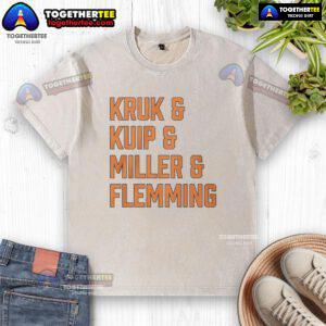 Nice Kruk and Kuip and Miller and Flemming washed t-shirt displayed on a hanger with a casual backdrop.