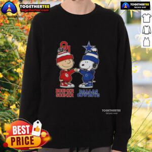 Official Charlie Brown Fist Bump Snoopy Bommer Sooner X Dallas Cowboys Sweatshirt featuring playful cartoon design.