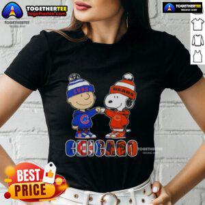 Alt Text: Official Charlie Brown fist bump with Snoopy, featuring Chicago City Sports Cubs x Bears ladies tee design.