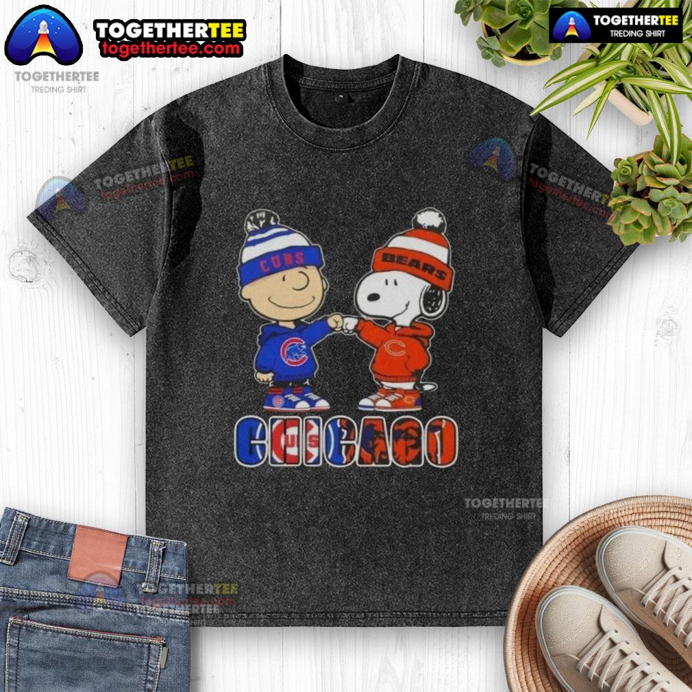 Official Charlie Brown fist bump with Snoopy on a washed T-shirt celebrating Chicago Cubs and Bears city sports.
