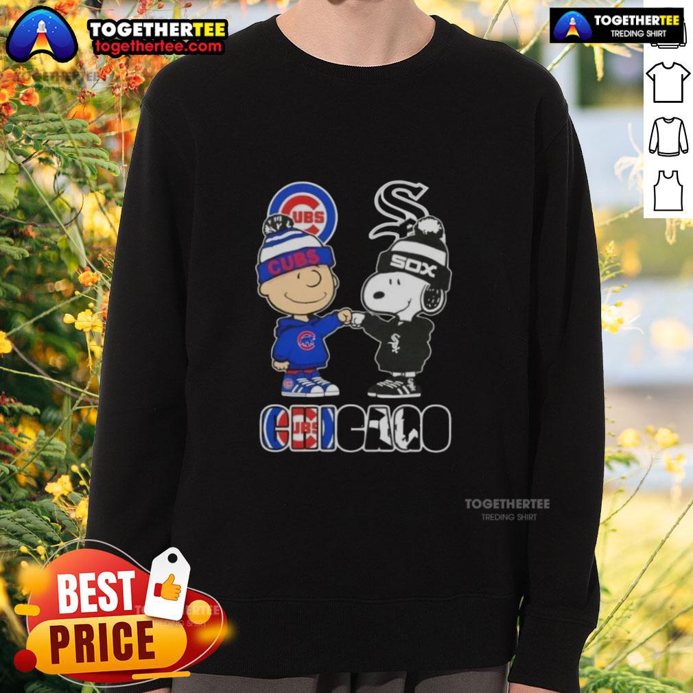 Alt Text: Official Charlie Brown fist bump with Snoopy on a Chicago City Sports Cubs x White Sox sweatshirt.