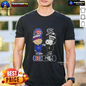 Official Charlie Brown fist bump with Snoopy on Chicago Cubs vs White Sox T-shirt design for sports fans.