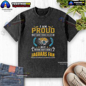 Washed t-shirt featuring 'I Am Proud Of Many Things In Life, But Nothing Beats Being A Jacksonville Jaguars Fan' design.