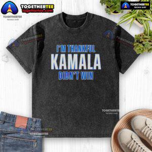Official 'I'm Thankful Kamala Didn't Win' washed t-shirt featuring bold text and a trendy design for political humor.