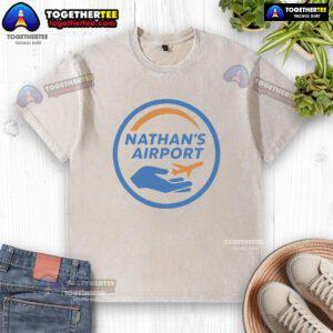 Alt Text: Official Nathan's Airport logo on a washed t-shirt, showcasing a stylish and comfortable design for aviation enthusiasts.