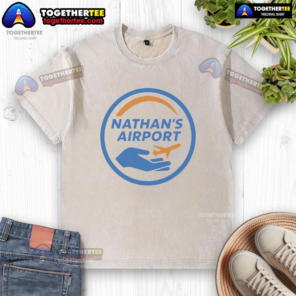 Alt Text: Official Nathan's Airport logo on a washed t-shirt, showcasing a stylish and comfortable design for aviation enthusiasts.