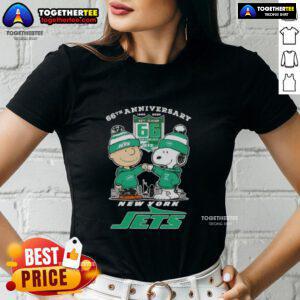 Alt Text: Original Charlie Brown fist bump with Snoopy against New York Jets skyline for 66th Anniversary ladies tee.