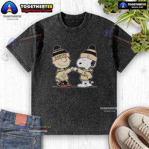 Alt Text: Top New Orleans Saints Snoopy and Charlie Brown best friends washed t-shirt in vibrant colors, perfect for fans.