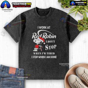 Alt Text: Snoopy graphic on a Christmas t-shirt reading 'I Work At Red Robin, I Don't Stop When I'm Tired, I Stop When I'm Done.'