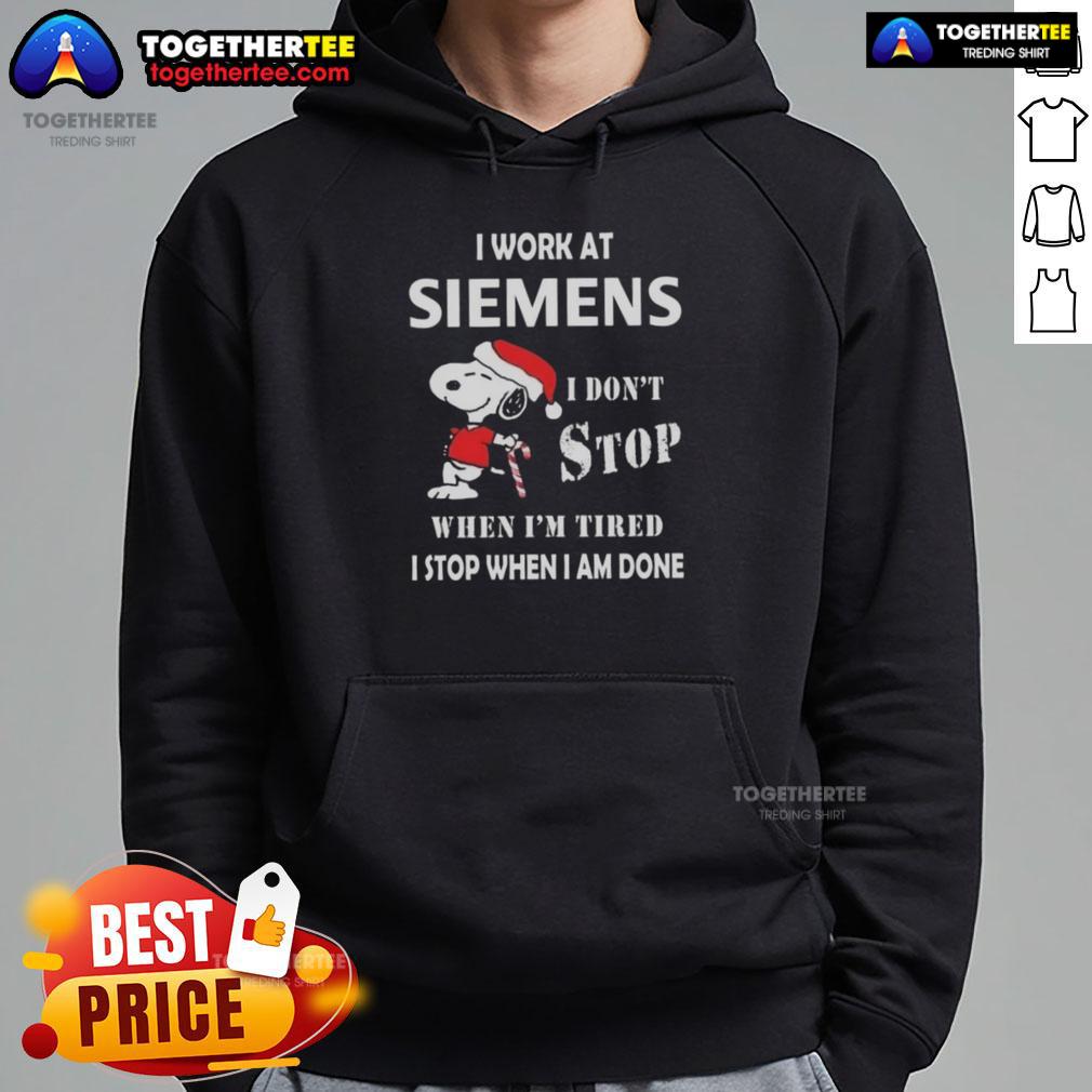 Snoopy Christmas hoodie with 'I work at Siemens, I dont stop when Im tired, I stop when Im done' design.