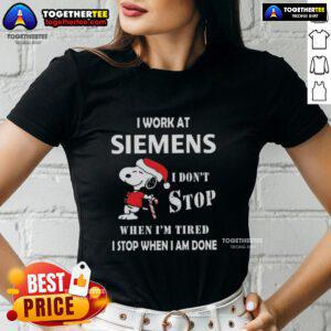 Top Snoopy I Work At Siemens I Don't Stop When I'm Tired Christmas Ladies Tee featuring a fun Snoopy graphic design.
