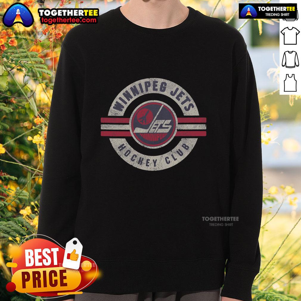 Vintage Winnipeg Jets sweatshirt in surround style, featuring team colors and logo, perfect for nostalgic fans.