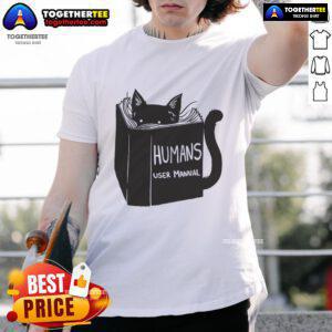 Awesome Humans User Manual For Cats Remix T-Shirt featuring a playful design with cat graphics and vibrant colors.