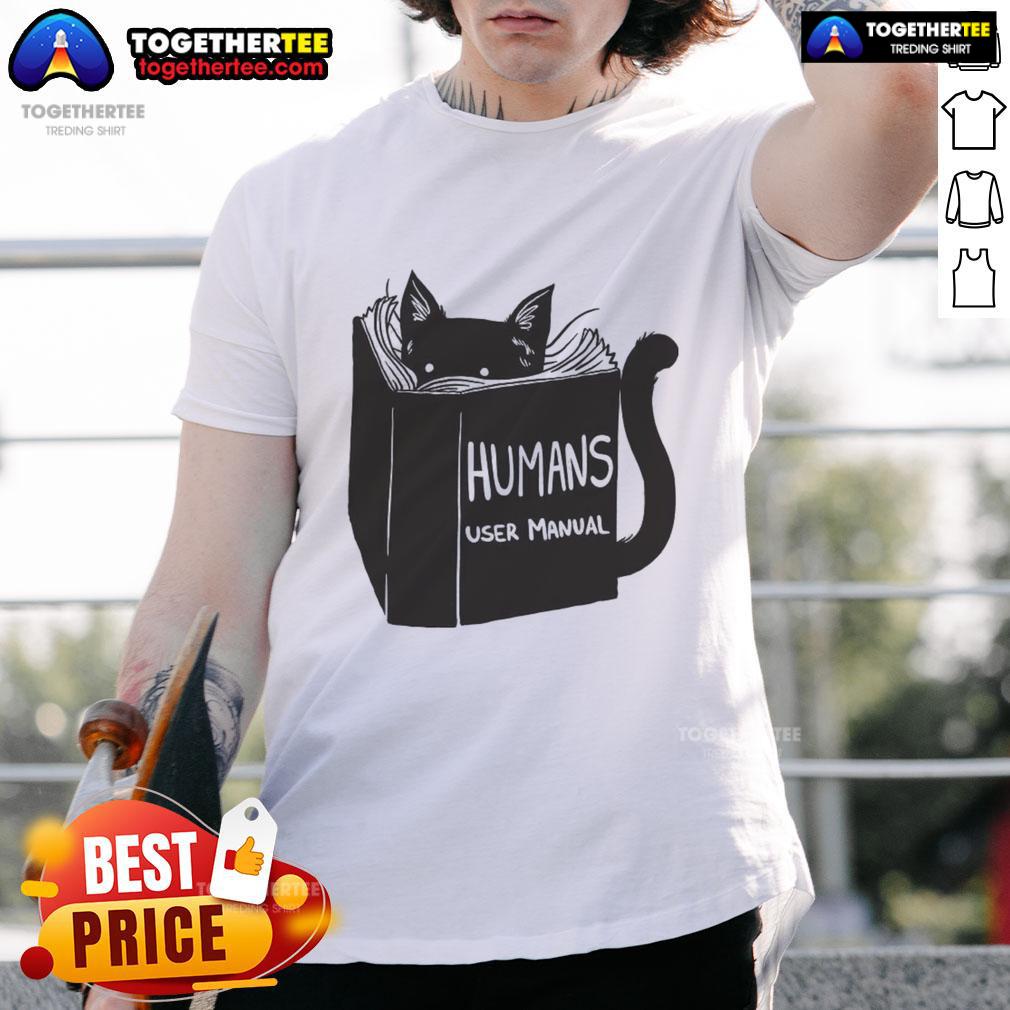 Awesome Humans User Manual For Cats Remix T-Shirt featuring a playful design with cat graphics and vibrant colors.