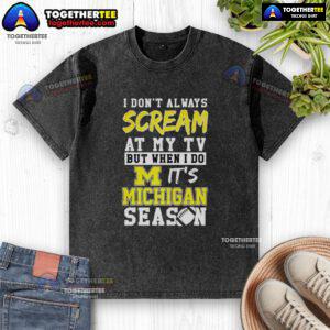 Alt Text: Michigan Wolverines NCAA football lover washed t-shirt, perfect for cheering during game day.