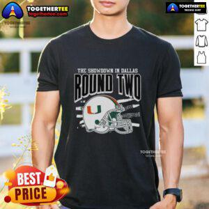 Alt Text: Official Miami Hurricanes NCAA CFP The Showdown in Dallas Round Two helmet T-shirt featuring team logo and design.