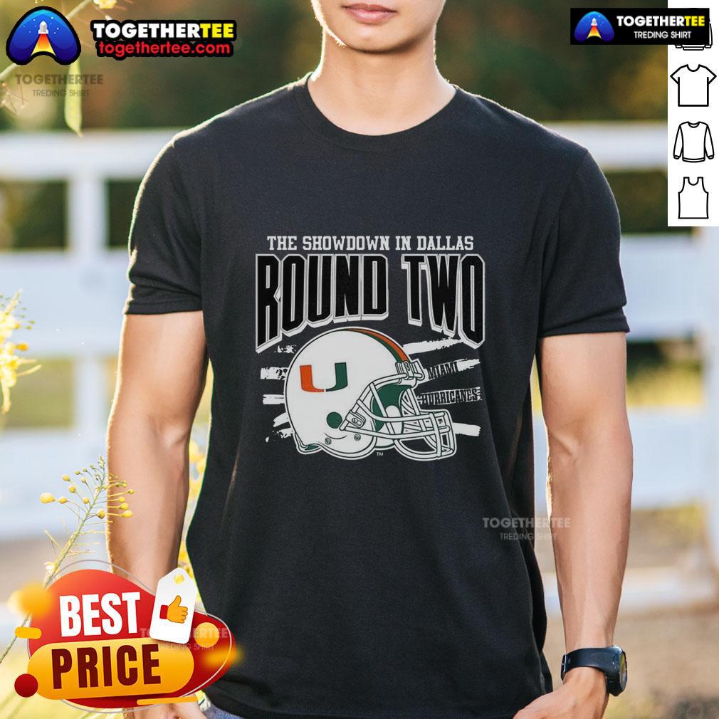 Alt Text: Official Miami Hurricanes NCAA CFP The Showdown in Dallas Round Two helmet T-shirt featuring team logo and design.