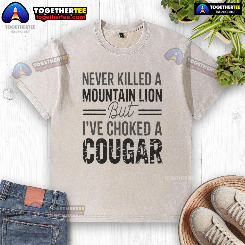 Official Never Killed A Mountain But Lion T-Shirt featuring a humorous cougar design for outdoor enthusiasts.