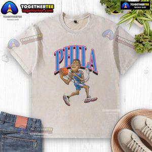 Official Philadelphia 76ers basketball player caricature on a washed t-shirt, showcasing team spirit and unique design.