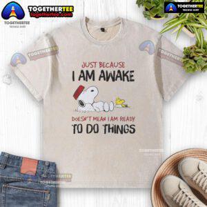Alt Text: Official Snoopy Just Because I Am Awake Doesn't Mean I Am Ready To Do Things washed t-shirt featuring Snoopy design.