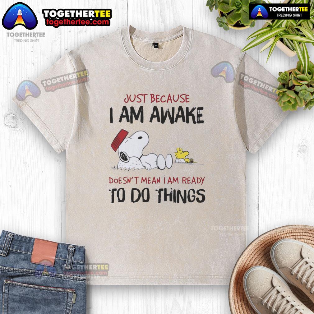 Alt Text: Official Snoopy Just Because I Am Awake Doesn't Mean I Am Ready To Do Things washed t-shirt featuring Snoopy design.