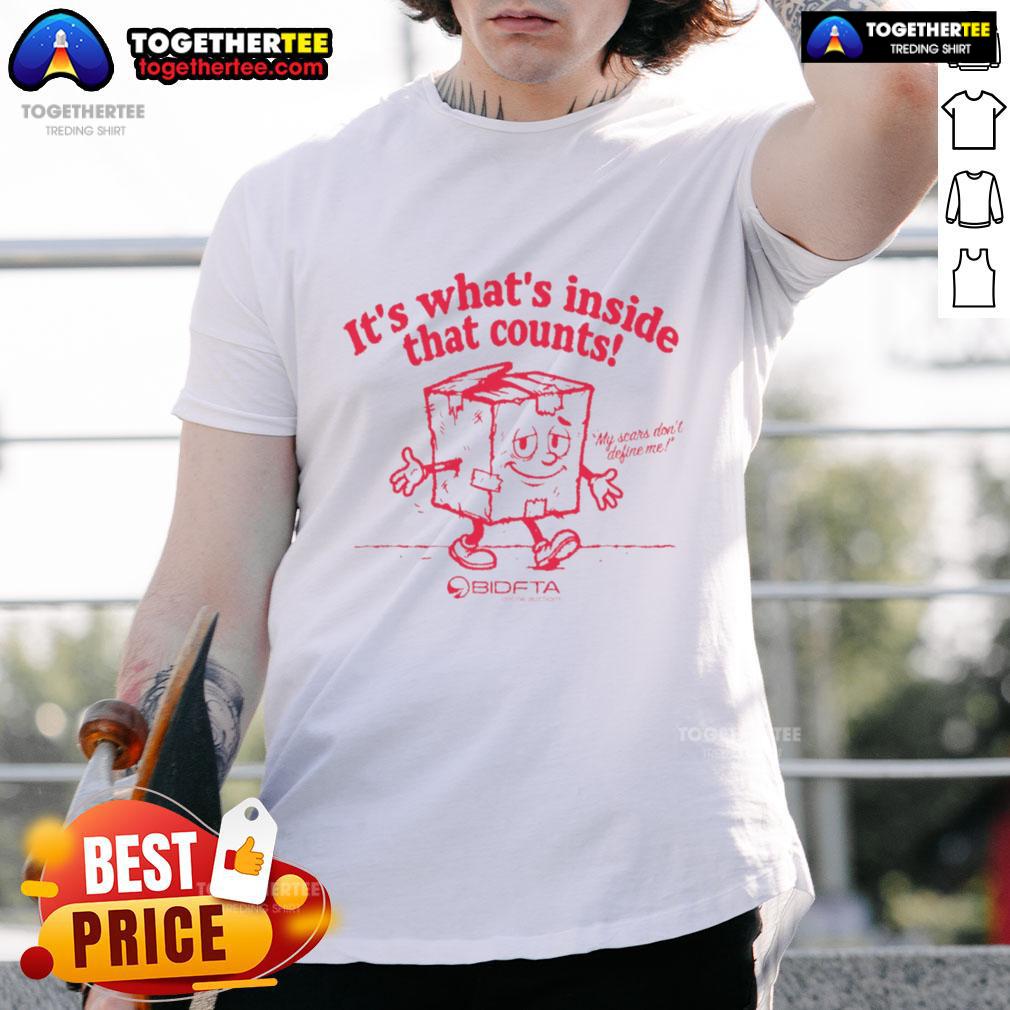 Alt Text: Top It's What's Inside That Counts Bidfta T-Shirt featuring a stylish design and motivational message.