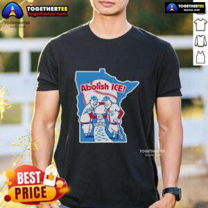 Top Abolish Ice Twins T-Shirt featuring bold graphics and a stylish design for activists and supporters of immigration reform.