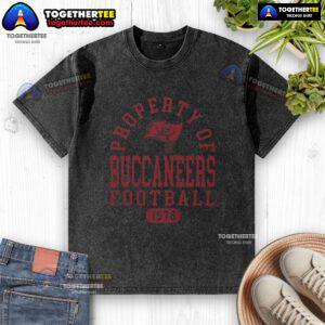 Original Tampa Bay Buccaneers property 1976 washed t-shirt in vibrant colors, showcasing team pride and vintage style.