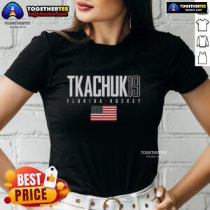 Pretty Matthew Tkachuk wearing a Florida Panthers USA flag elite ladies tee, showcasing team spirit and style.