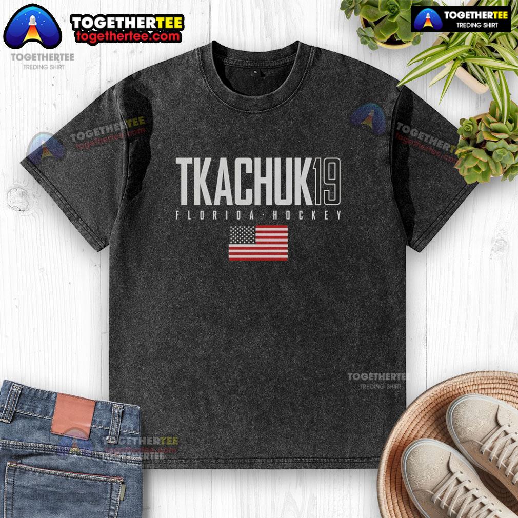 Pretty Matthew Tkachuk 19 Florida Panthers USA Flag Elite Washed T-Shirt showcasing vibrant design for fans.