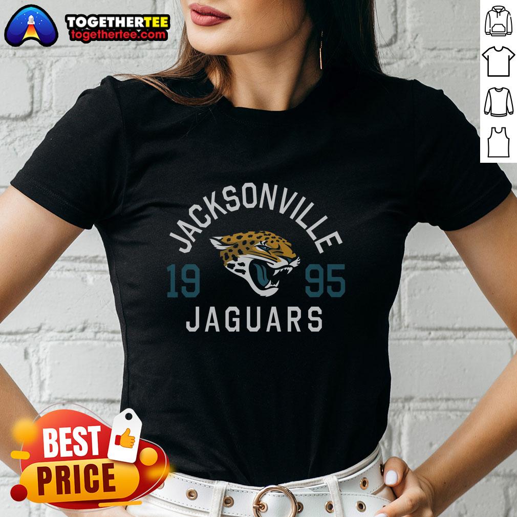 Alt Text: Hot Jacksonville Jaguars Heritage Print Ladies Tee featuring vibrant team colors and stylish design for fans.