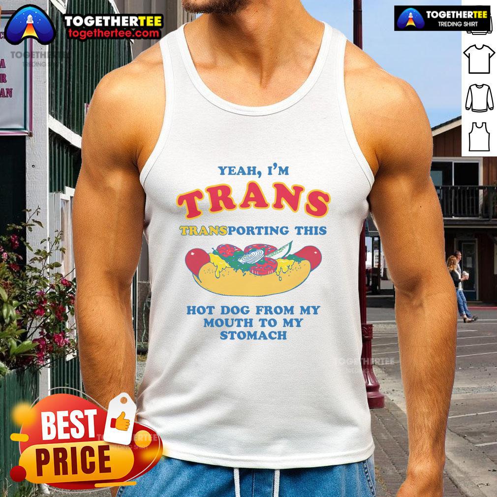Person in a tank top smiling while transporting a hot dog from mouth to stomach, showcasing their fun personality.
