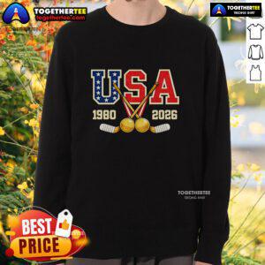 Vintage USA Champions sweatshirt featuring 1980 and 2026 hockey designs, perfect for sports fans and collectors.