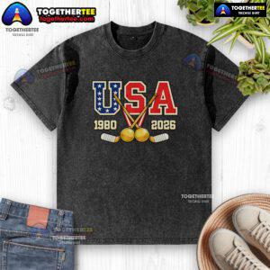 Vintage USA Champions washed t-shirt featuring 1980 and 2026 hockey graphics, perfect for sports fans and collectors.