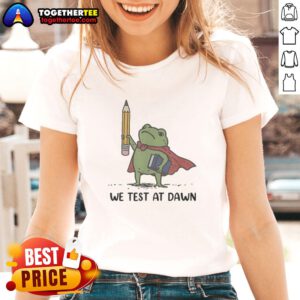 Premium teacher frog holding a giant pencil and calculus book, promoting 'We Test at Dawn' ladies tee design.