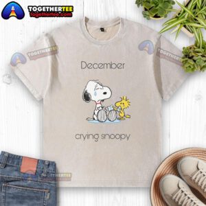 Pretty December crying Snoopy and Woodstock design on a washed t-shirt, perfect for Peanuts fans.