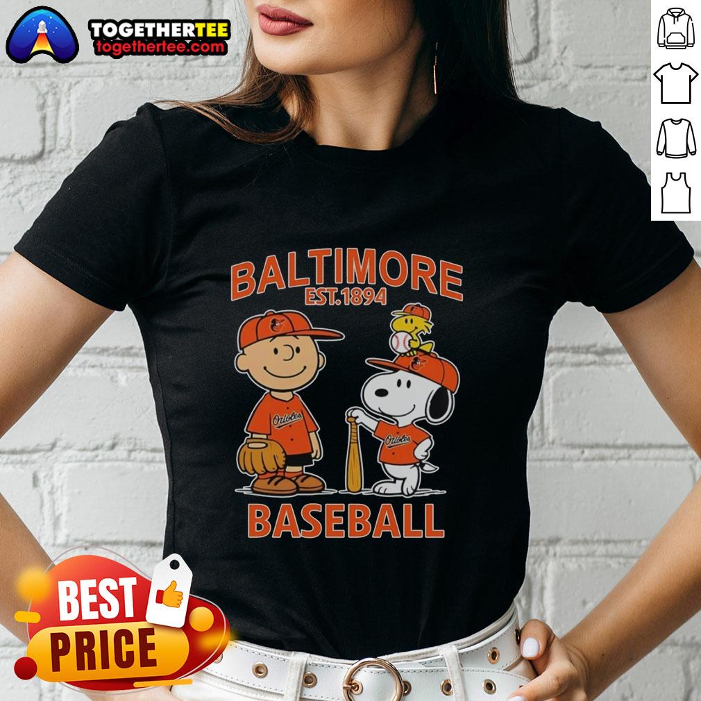 Top Charlie Brown, Snoopy, and Woodstock in Baltimore Orioles jersey Est. 1894 on a stylish ladies tee.