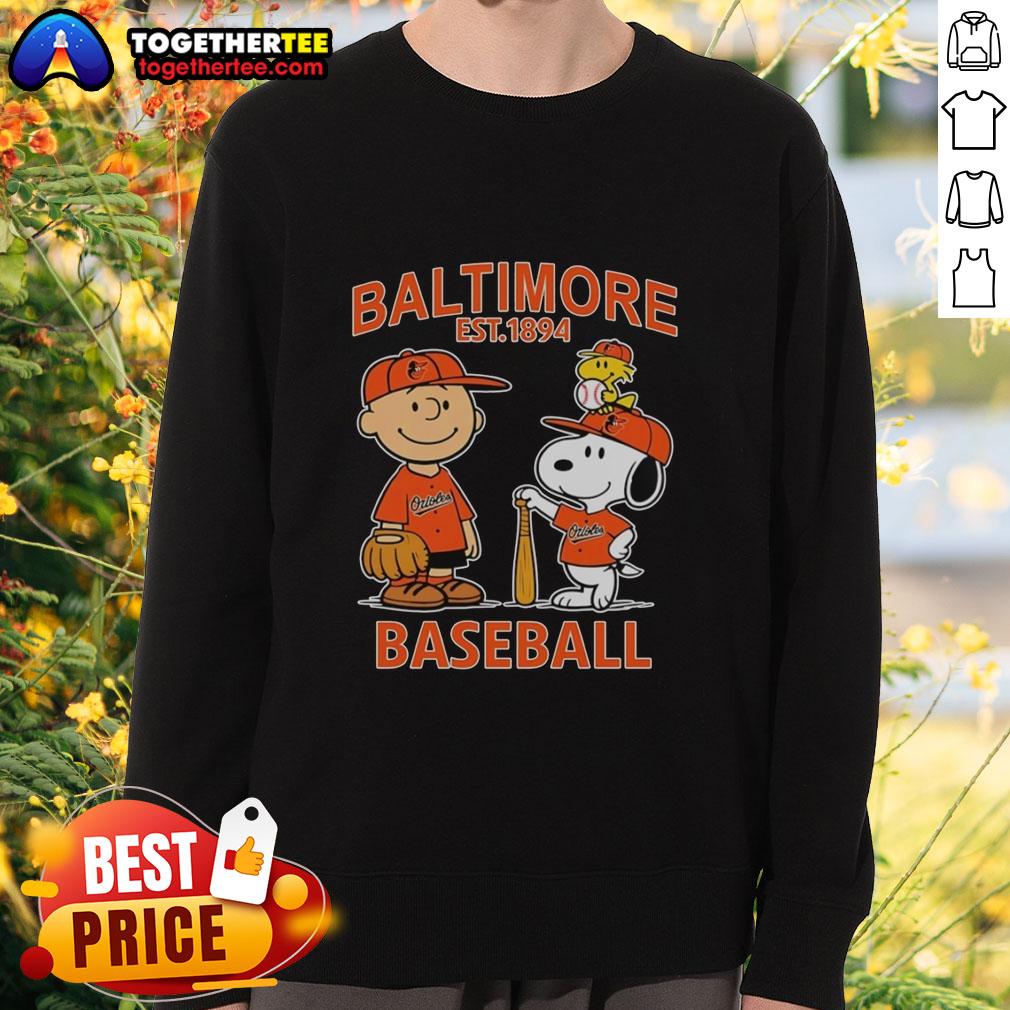 Alt Text: Charlie Brown, Snoopy, and Woodstock in Baltimore Orioles baseball jersey sweatshirt, celebrating Est. 1894.