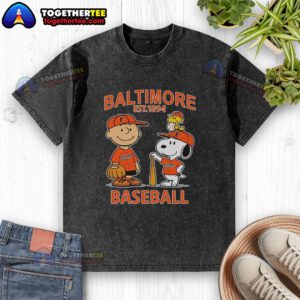 Alt Text: Charlie Brown, Snoopy, and Woodstock in a Baltimore Orioles baseball jersey, vintage washed t-shirt design.