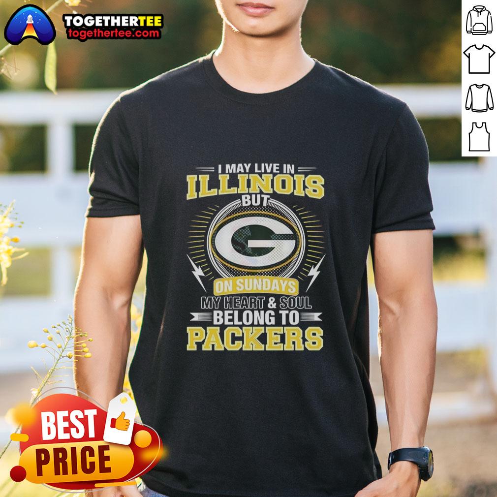 Green Bay Packers NFL t-shirt with 'I may live in Illinois, but my heart belongs to Packers' slogan. Perfect for fans!
