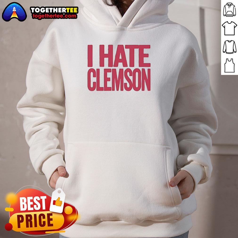 Good Greg Clark I Hate Clemson hoodie worn by a fan at a football game, showcasing team spirit and rivalry.