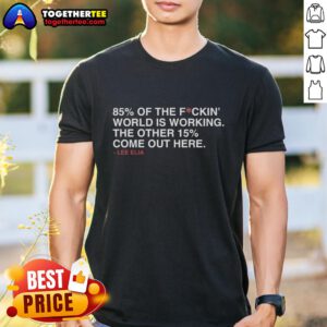 Alt Text: Good Lee Elia 85 Percent Of The Fuckin' World Is Working T-Shirt featuring bold text design in vibrant colors.